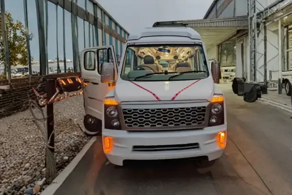 White 9 seater Tempo Traveller on rent in Delhi for group travel