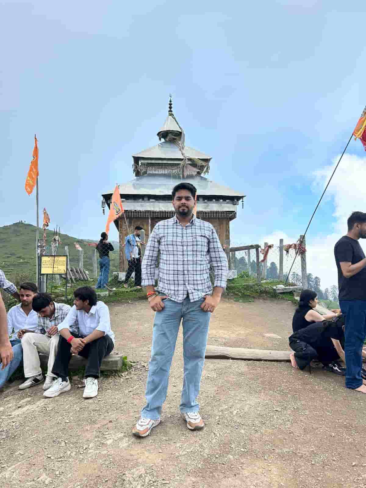 Four friends exploring Moyla Top in Uttarakhand after travelling from Delhi
