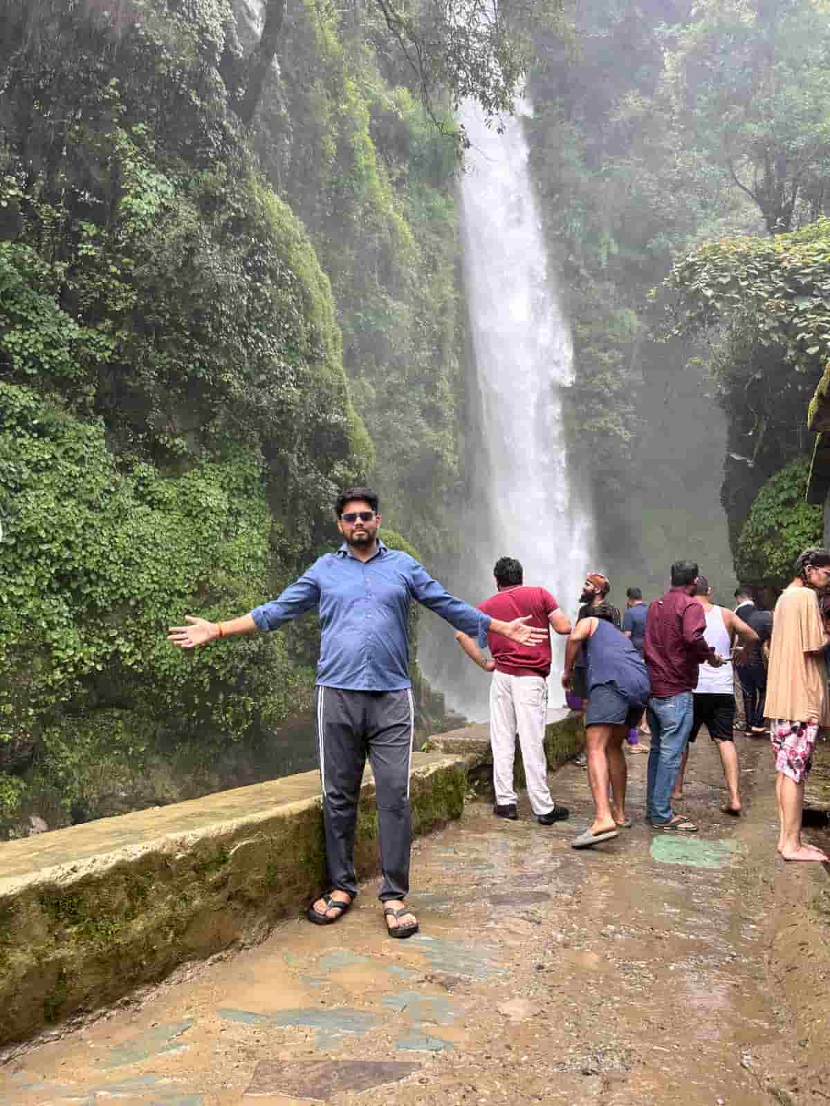 Friends visiting Tiger Fall during their Delhi to Chakrata road trip
